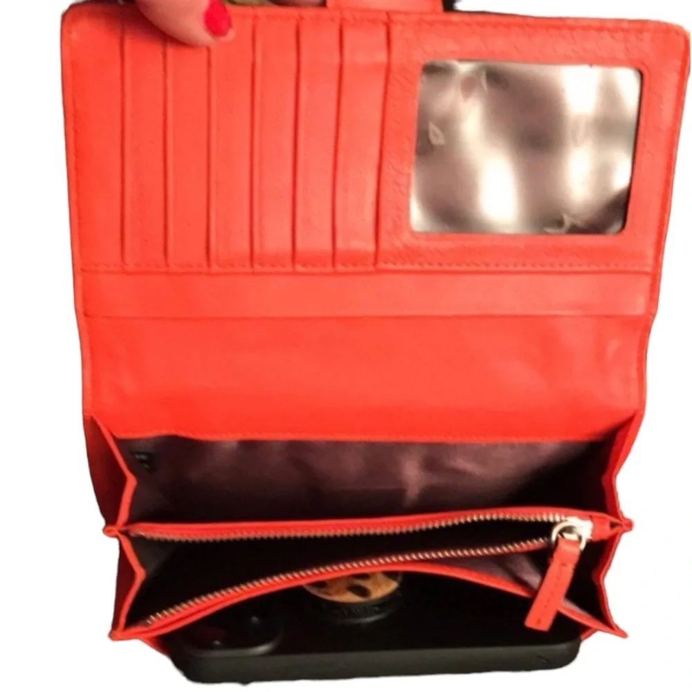 Milly wristlet orange mobile wallet front snap ,zip  lots of pockets